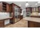 Kitchen with stainless steel appliances and island at 7618 E Ironwood Dr, Scottsdale, AZ 85258