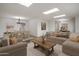 Open concept living and dining area with plenty of natural light at 7618 E Ironwood Dr, Scottsdale, AZ 85258