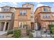 Three-story townhome with private patio and well-manicured landscaping at 7771 W Pipestone Pl, Phoenix, AZ 85035