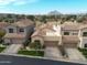 Luxury community with Spanish-style homes, lush landscaping, and mountain backdrop at 8100 E Camelback Rd # 41, Scottsdale, AZ 85251