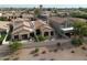 Aerial view of the home's exterior, showcasing a patio and neighboring houses at 8100 E Camelback Rd # 41, Scottsdale, AZ 85251