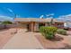 Brick ranch home with carport and mature landscaping at 8448 E Cambridge Ave, Scottsdale, AZ 85257