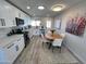 Modern kitchen with white cabinets, stainless steel appliances, and breakfast nook at 8448 E Cambridge Ave, Scottsdale, AZ 85257