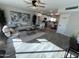 Open concept living room and kitchen with hardwood floors at 8448 E Cambridge Ave, Scottsdale, AZ 85257