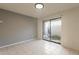 Bedroom with sliding door to patio at 850 S River Dr # 1092, Tempe, AZ 85281