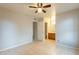 Bedroom with bathroom access and ceiling fan at 850 S River Dr # 1092, Tempe, AZ 85281