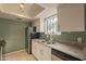 Kitchen with granite countertops and green walls at 850 S River Dr # 1092, Tempe, AZ 85281
