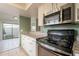 Kitchen features stainless steel appliances at 850 S River Dr # 1092, Tempe, AZ 85281