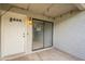 Private patio with sliding glass door access and string lights at 850 S River Dr # 1092, Tempe, AZ 85281