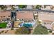 Aerial view of the house, pool, and surrounding neighborhood at 8729 W Tonopah Dr, Peoria, AZ 85382