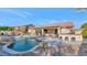 Inviting backyard oasis with a sparkling pool and patio at 8729 W Tonopah Dr, Peoria, AZ 85382