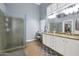 Elegant bathroom with granite countertops and walk-in shower at 8729 W Tonopah Dr, Peoria, AZ 85382