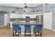 Island kitchen with granite countertops and stainless steel appliances at 8729 W Tonopah Dr, Peoria, AZ 85382