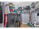Laundry room with washer, dryer, and ample storage at 8729 W Tonopah Dr, Peoria, AZ 85382