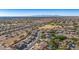 Wide aerial view of the neighborhood with mountain views in the background at 8729 W Tonopah Dr, Peoria, AZ 85382