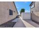 Side yard with storage shed and walkway at 8729 W Tonopah Dr, Peoria, AZ 85382