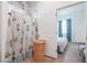 Bathroom with shower and access to bedroom at 10428 S 294Th Ave, Palo Verde, AZ 85343