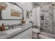 Bathroom with granite vanity and tiled shower at 10428 S 294Th Ave, Palo Verde, AZ 85343