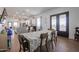 Bright dining area with wood table and kitchen view at 10428 S 294Th Ave, Palo Verde, AZ 85343