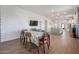 Bright dining area with wood table and kitchen view at 10428 S 294Th Ave, Palo Verde, AZ 85343