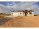 New single-story home with attached garage and desert landscaping at 10428 S 294Th Ave, Palo Verde, AZ 85343