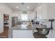 Modern kitchen with stainless steel appliances and granite countertops at 10428 S 294Th Ave, Palo Verde, AZ 85343