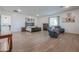 Main bedroom with sitting area and wood flooring at 10428 S 294Th Ave, Palo Verde, AZ 85343