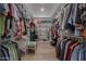 Large walk-in closet with ample shelving and hanging space at 10428 S 294Th Ave, Palo Verde, AZ 85343