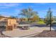 Relaxing backyard with firepit and stone bench at 12692 W Toltec Cir, Casa Grande, AZ 85194