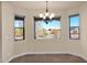 Breakfast nook with large windows offering backyard views at 12692 W Toltec Cir, Casa Grande, AZ 85194