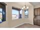 Bright breakfast nook with scenic views and chandelier at 12692 W Toltec Cir, Casa Grande, AZ 85194