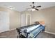 Bright craft room with tile floor, ample space, and built-in cabinetry at 12692 W Toltec Cir, Casa Grande, AZ 85194