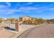 Driveway leading to a house with a gated entrance at 12692 W Toltec Cir, Casa Grande, AZ 85194