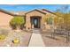 Ornate front entry with a stone facade and walkway at 12692 W Toltec Cir, Casa Grande, AZ 85194