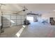 Attached garage with extra storage space and open door at 12692 W Toltec Cir, Casa Grande, AZ 85194