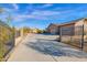 Two-car garage with a large concrete driveway at 12692 W Toltec Cir, Casa Grande, AZ 85194