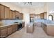 Modern kitchen with granite countertops and stainless steel appliances at 12692 W Toltec Cir, Casa Grande, AZ 85194