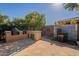 Outdoor kitchen with built-in grill and water feature at 1397 E Verde Blvd, Queen Creek, AZ 85140