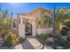 Elegant entry with wrought iron gate and pergola at 1397 E Verde Blvd, Queen Creek, AZ 85140