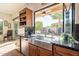 Kitchen with stainless steel appliances and granite countertops at 1397 E Verde Blvd, Queen Creek, AZ 85140