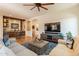 Open living area featuring comfortable seating and a built-in entertainment center at 1397 E Verde Blvd, Queen Creek, AZ 85140