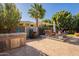 Outdoor patio with seating, fire pit and built-in BBQ at 1397 E Verde Blvd, Queen Creek, AZ 85140