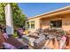 Enjoy this relaxing patio with fire pit and comfortable seating at 1397 E Verde Blvd, Queen Creek, AZ 85140