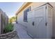 Storage shed and side yard with paved pathway at 14113 W Windsor Ave, Goodyear, AZ 85395