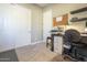 Home office with built-in desk and storage at 14113 W Windsor Ave, Goodyear, AZ 85395