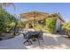 Outdoor patio with table and chairs, ideal for al fresco dining at 14113 W Windsor Ave, Goodyear, AZ 85395