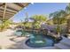 Stunning kidney-shaped pool with a tranquil waterfall feature at 14113 W Windsor Ave, Goodyear, AZ 85395