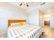 Spacious bedroom with ensuite access and a king-size bed at 14950 W Mountain View Blvd # 2301, Surprise, AZ 85374