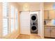 Laundry room features a stackable washer and dryer at 14950 W Mountain View Blvd # 2301, Surprise, AZ 85374