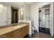 Bathroom with single vanity and walk-in closet at 15215 N Kierland Blvd # 632, Scottsdale, AZ 85254